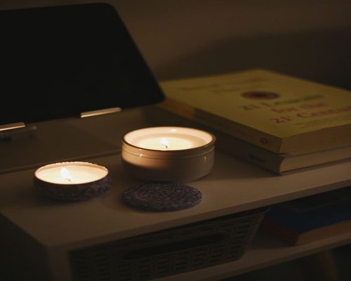 A quiet evening setting at home with a book and dim lighting